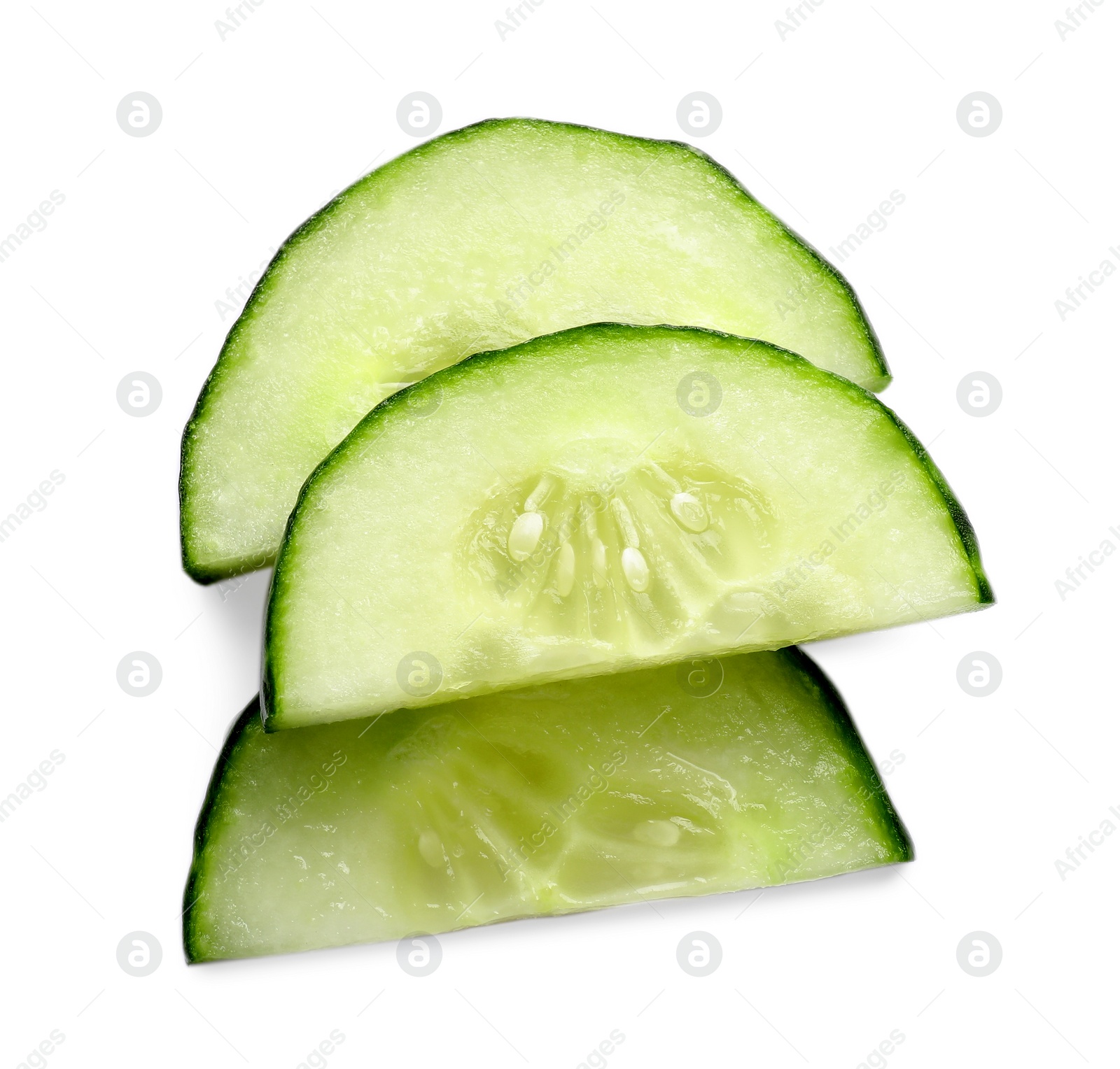 Photo of Slices of fresh cucumber isolated on white, top view