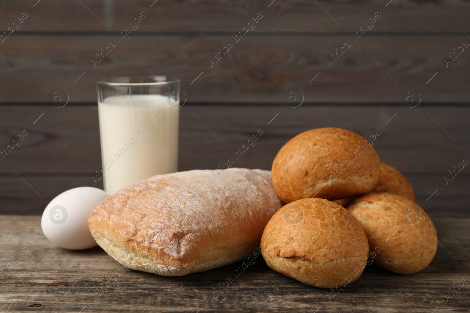 Photo of Allergenic food. Different fresh products on wooden table, closeup