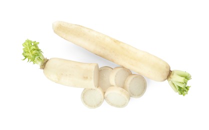 Photo of Sliced and whole fresh ripe turnips on white background, top view