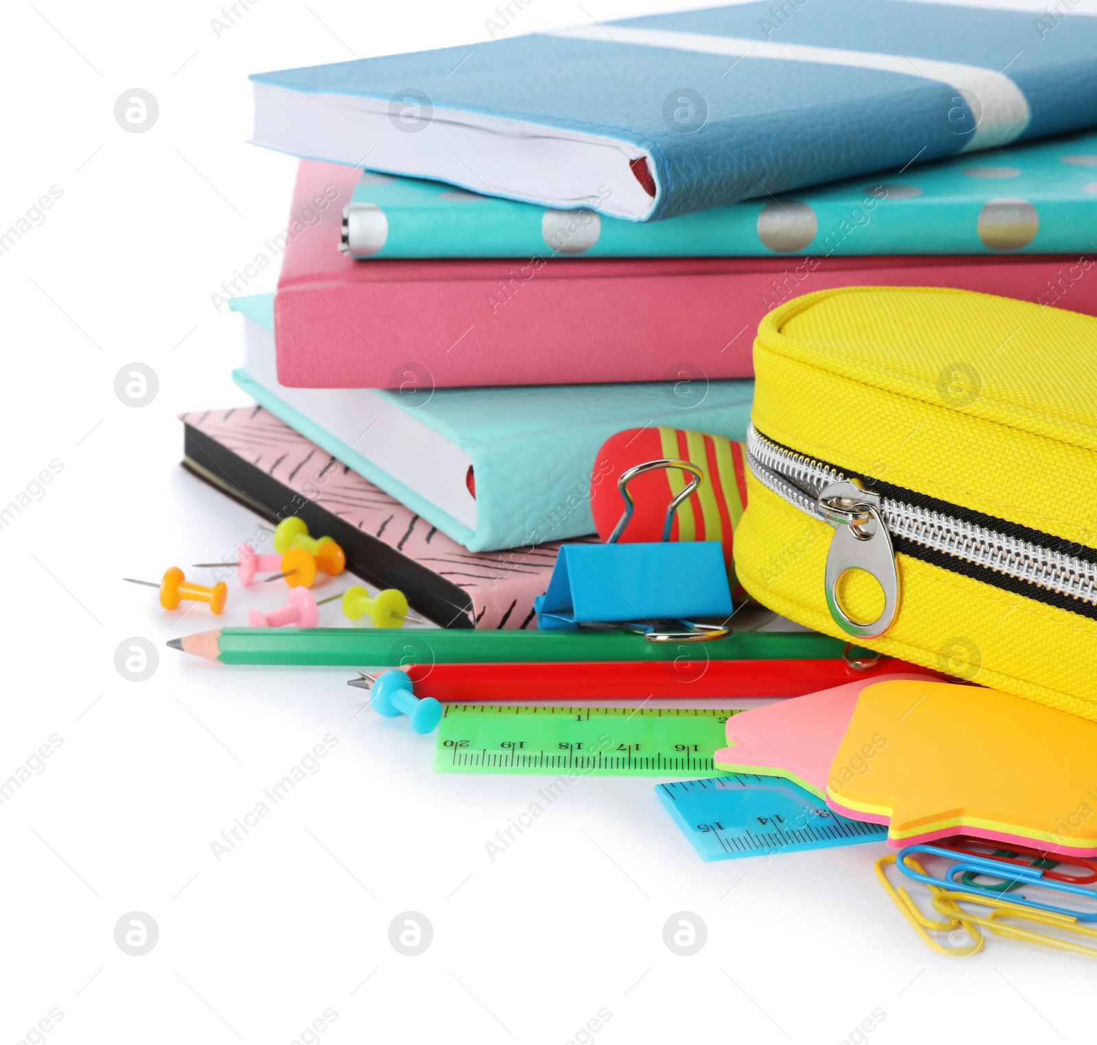 Photo of Different colorful stationery on white background. Back to school