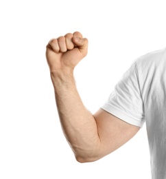 Photo of Young man showing clenched fist on white background