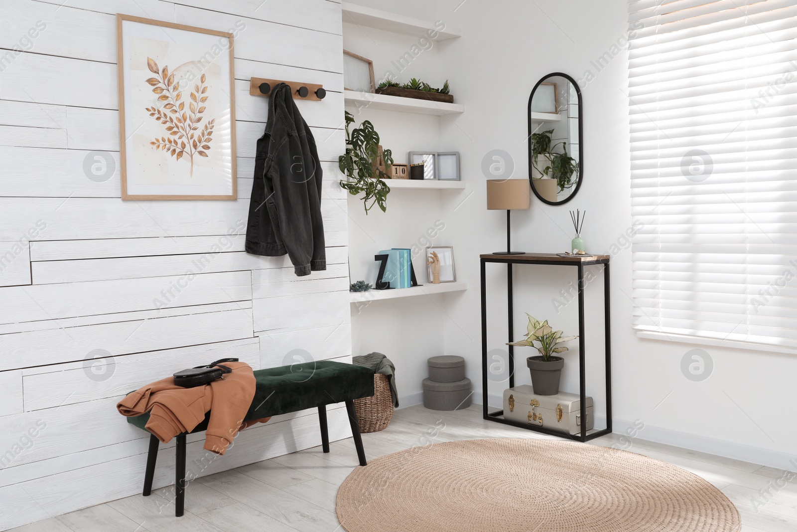 Photo of Hallway interior with console table and stylish decor