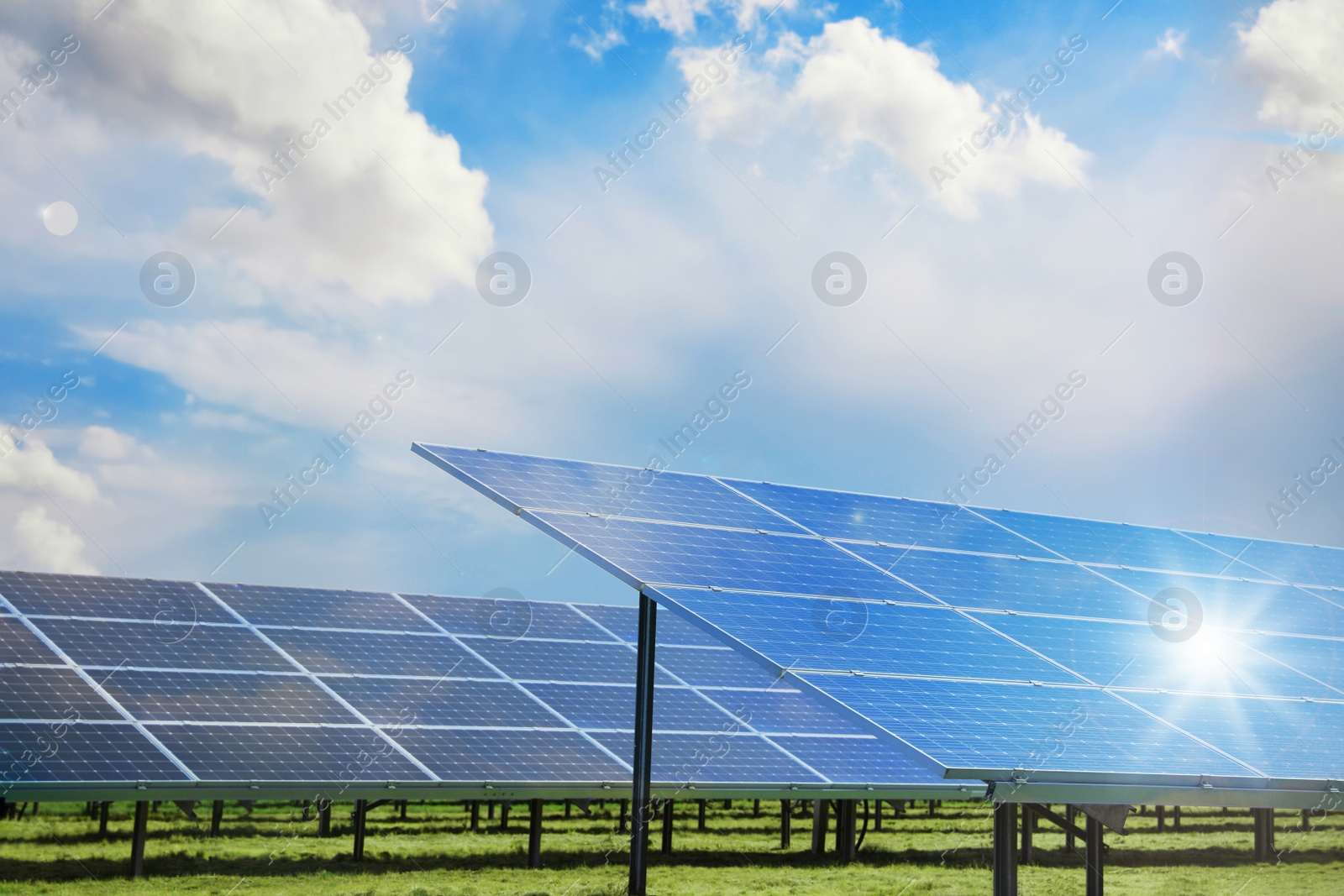 Image of Solar panels outdoors on sunny day. Alternative energy source