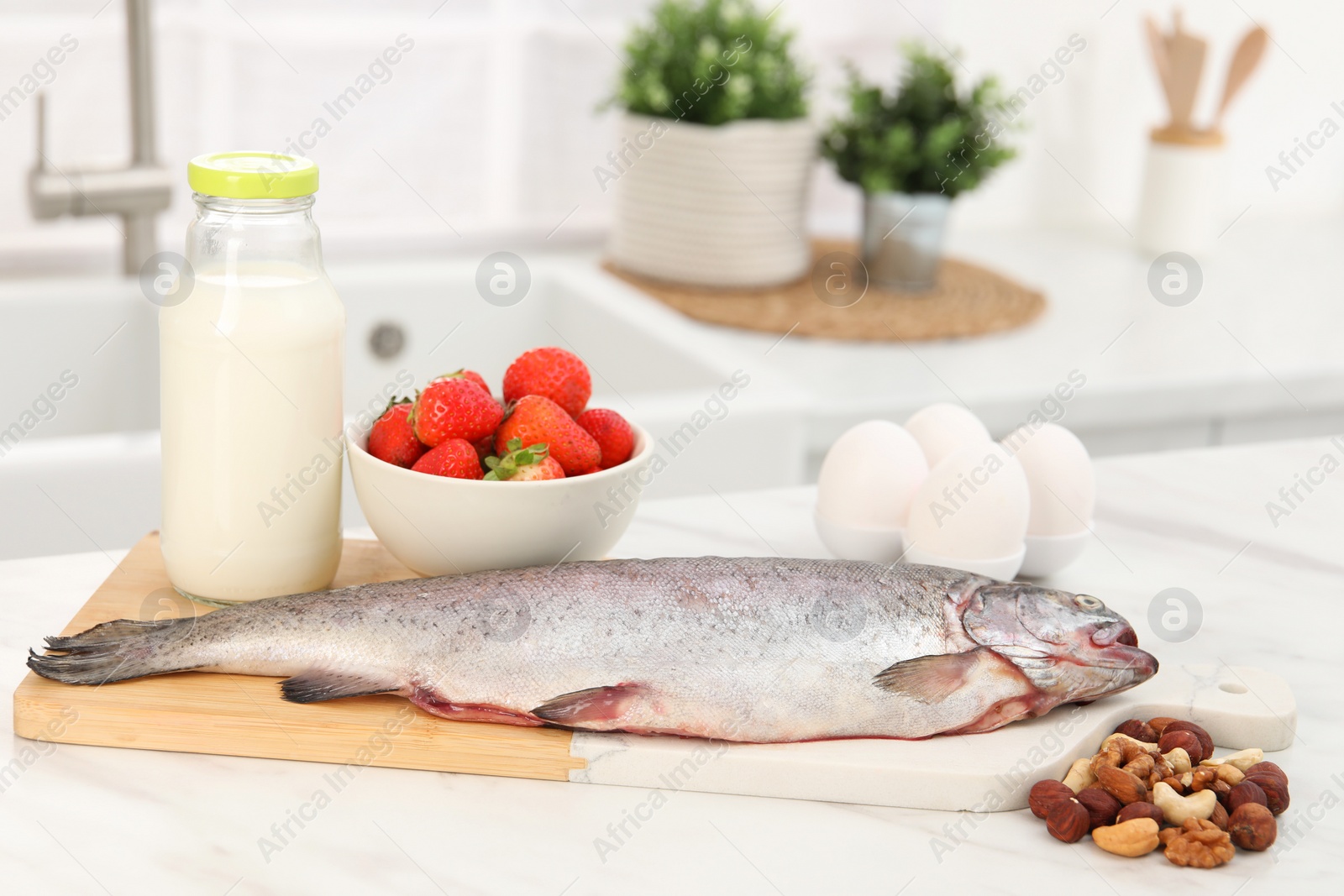 Photo of Allergenic food. Different fresh products on light table in kitchen