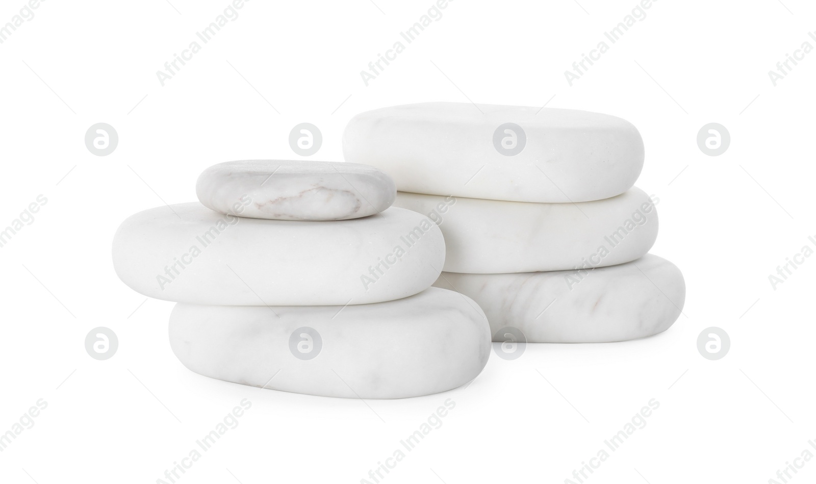Photo of Pile of spa stones isolated on white