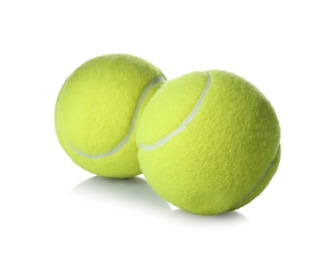 Photo of Tennis balls isolated on white. Sports equipment