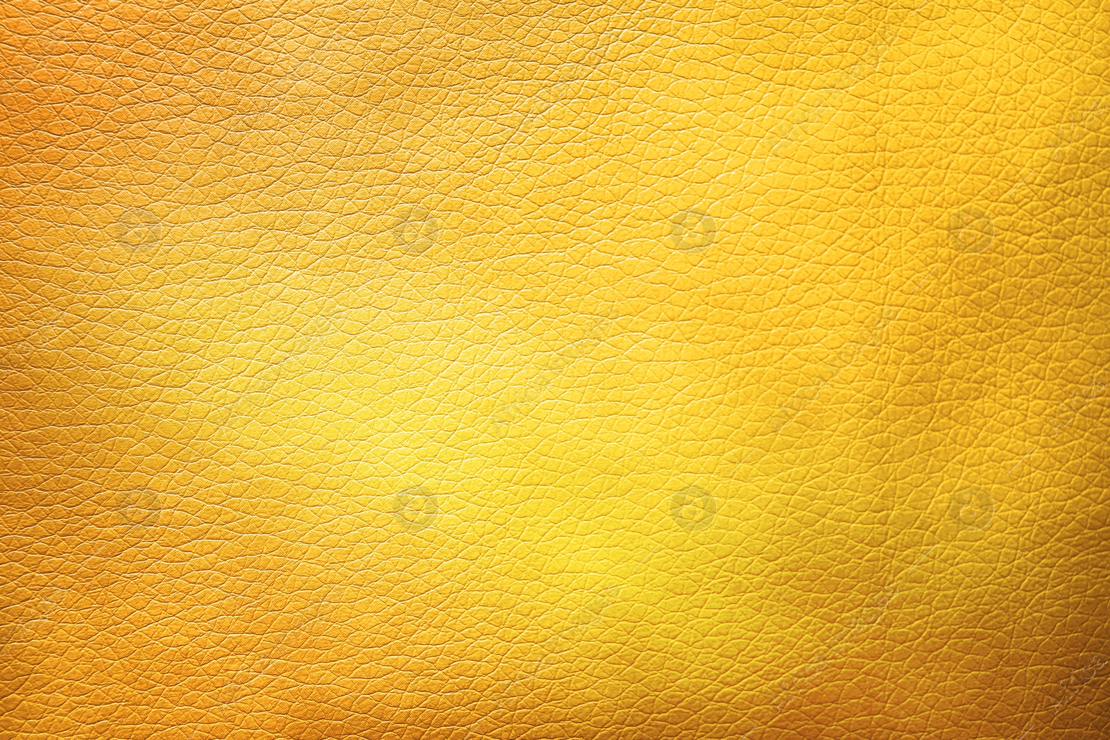 Image of Golden textured surface as background, closeup view