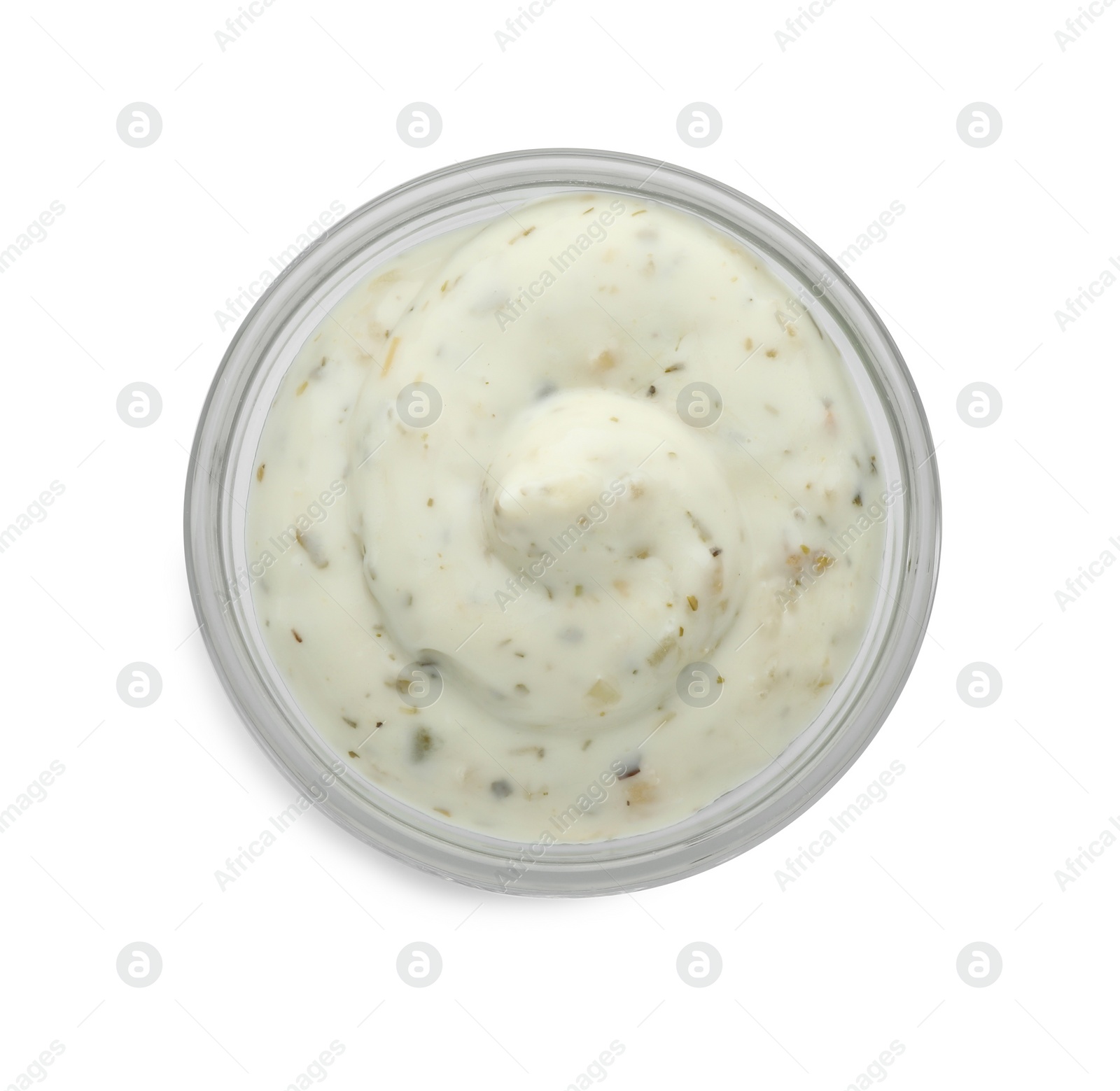 Photo of Tasty tartar sauce in bowl isolated on white, top view