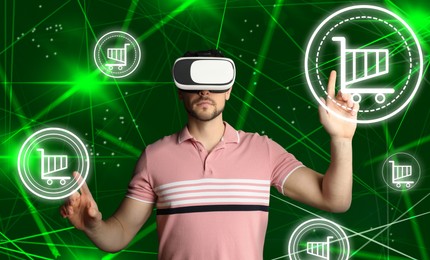 Image of Virtual shopping. Man using VR headset on color background