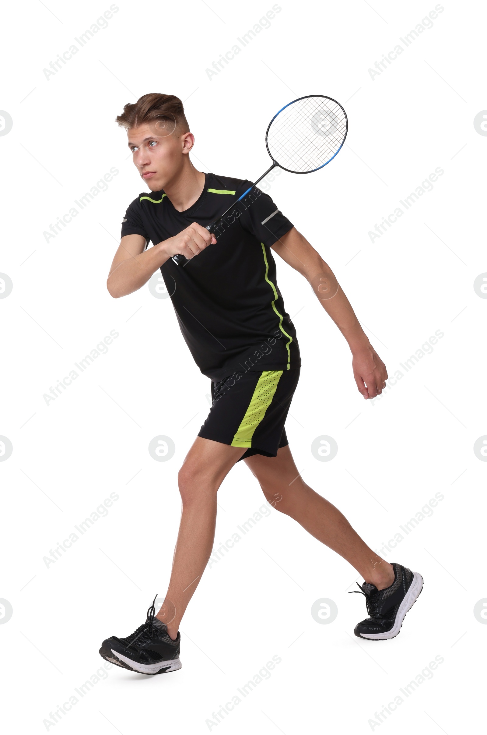 Photo of Young man playing badminton with racket on white background