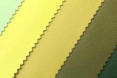 Photo of Leather samples of different colors for interior design as background