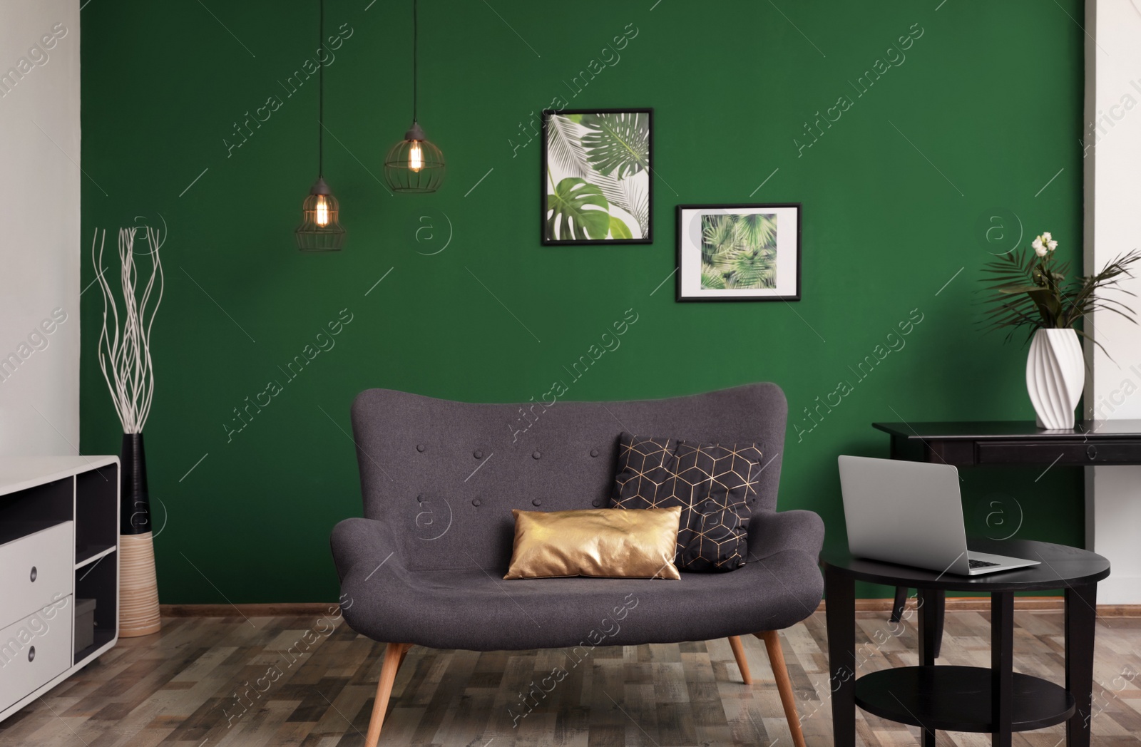 Photo of Modern living room interior stylish sofa near green wall