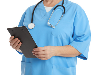 Photo of Mature doctor with clipboard on white background, closeup