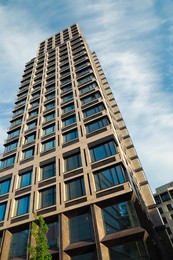 Photo of Beautiful modern building on sunny day, low angle view