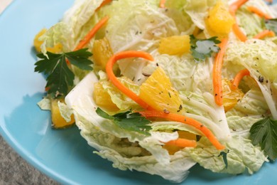 Photo of Tasty salad with Chinese cabbage on plate, closeup