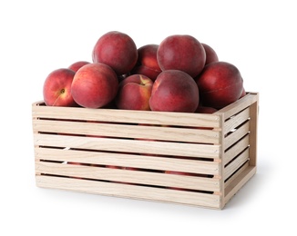 Photo of Crate of delicious ripe peaches isolated on white