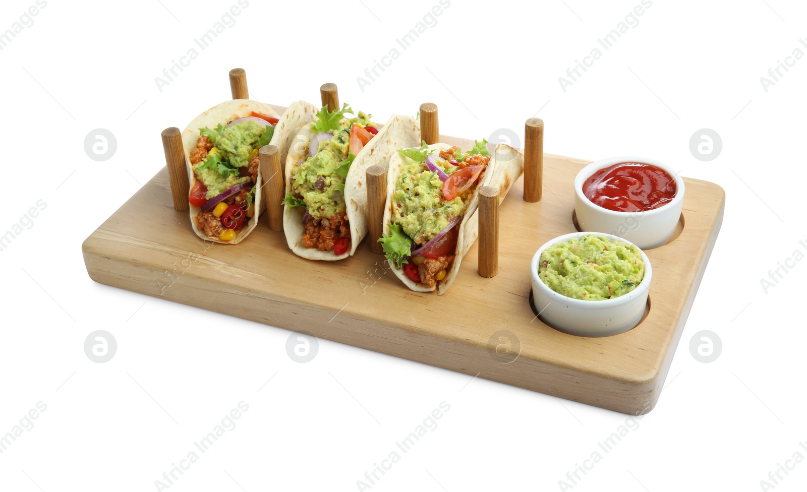 Photo of Delicious tacos with guacamole and vegetables isolated on white