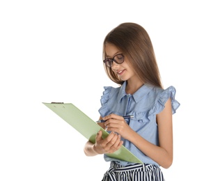 Cute little girl with clipboard and pen on white background