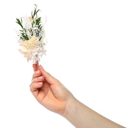 Woman holding stylish boutonniere on white background, closeup