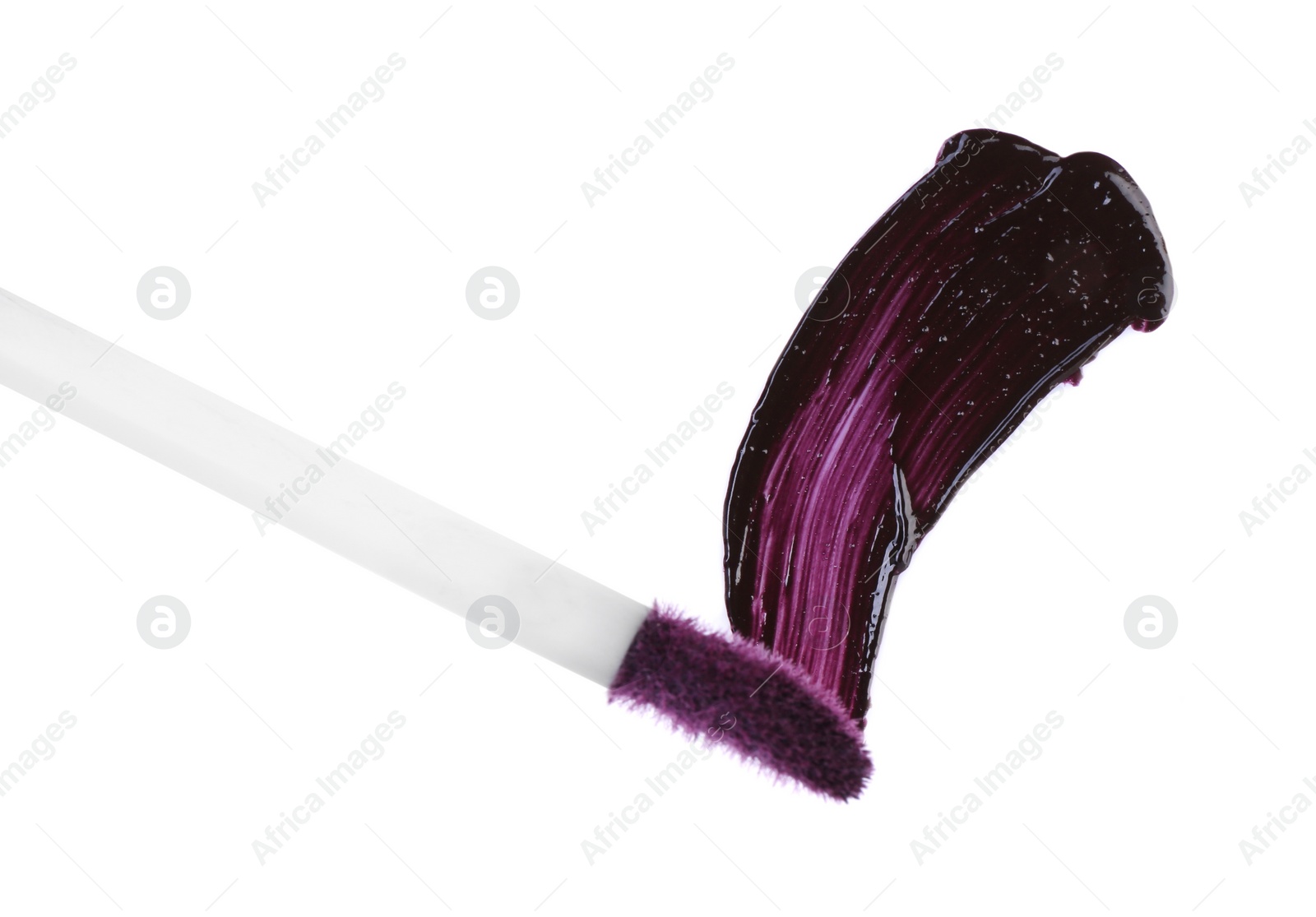 Photo of Stroke of purple lip gloss and applicator isolated on white, top view