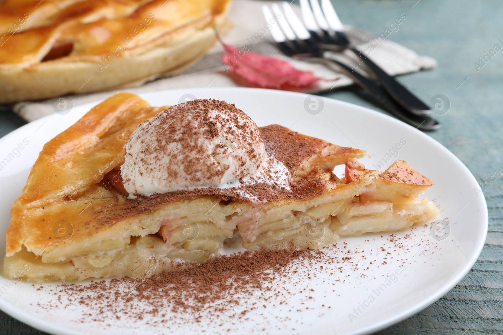 Photo of Slice of traditional apple pie with ice cream on plate, closeup