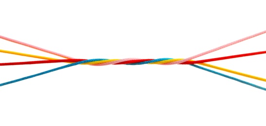 Photo of Twisted colorful ropes on white background. Unity concept