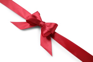 Photo of Red satin ribbon with bow on white background