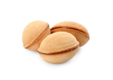 Photo of Delicious nut shaped cookies with boiled condensed milk on white background