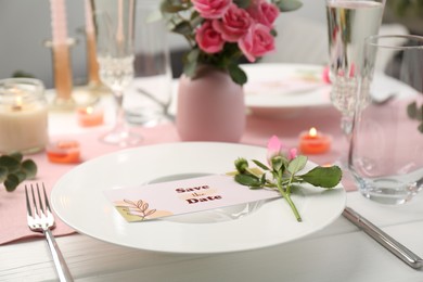 Photo of Romantic table setting with flowers and candles