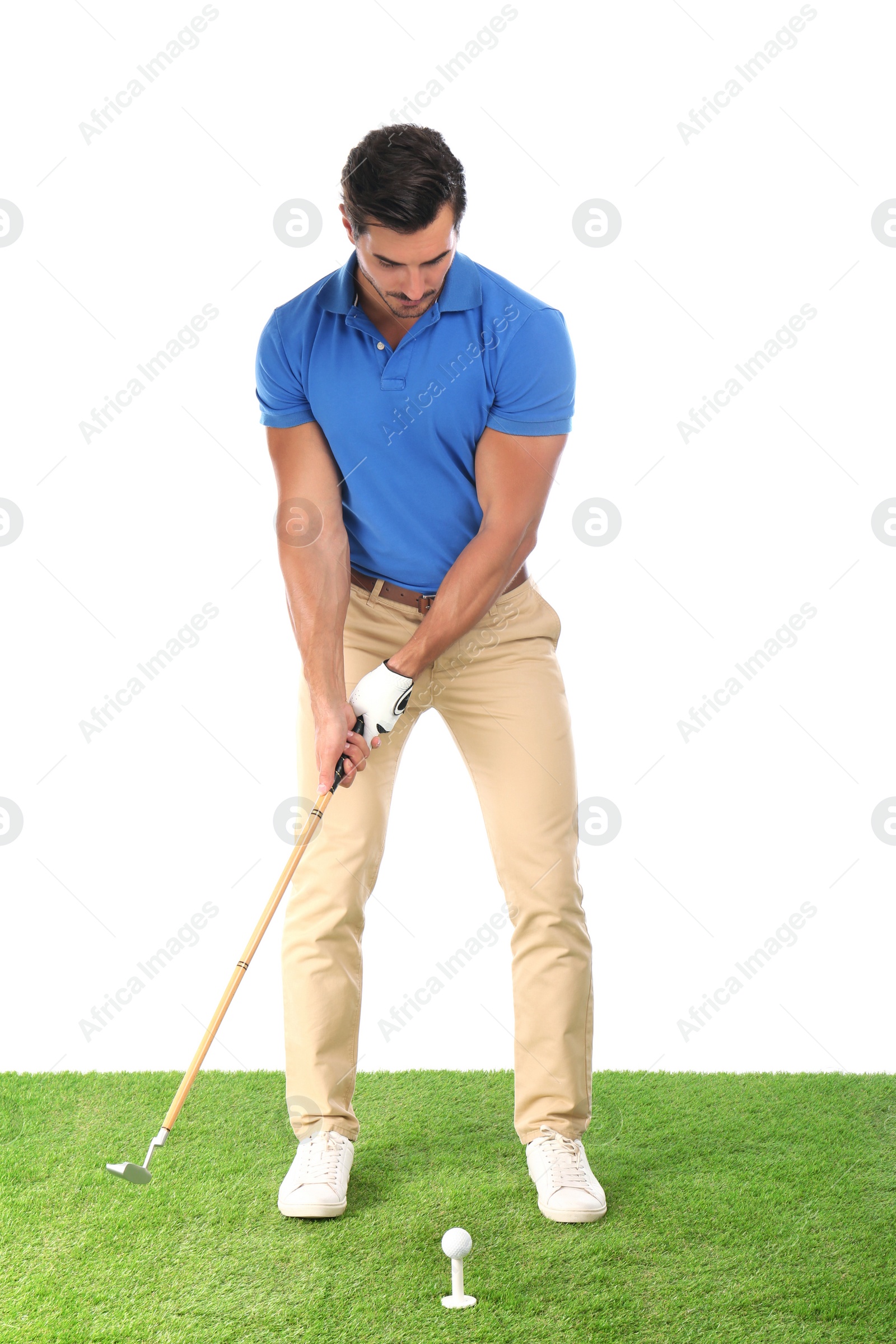 Photo of Young man playing golf on white background