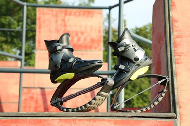 Stylish kangoo jumping boots in workout park