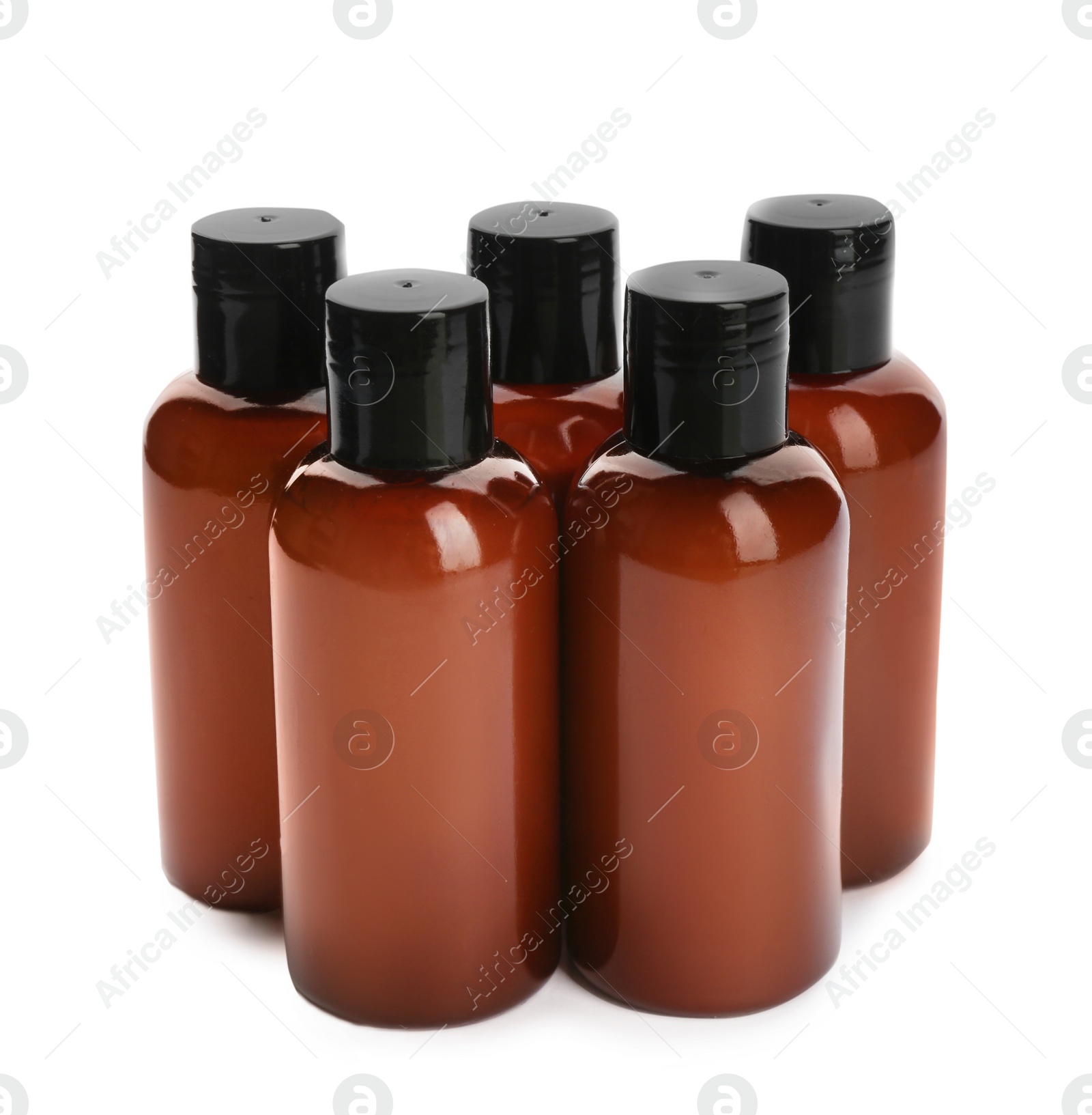 Photo of Mini bottles with cosmetic products on white background. Hotel amenities