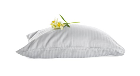 Photo of Soft pillow with beautiful flower on white background
