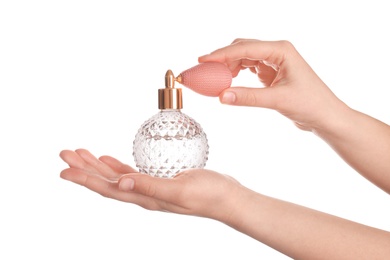 Photo of Woman with bottle of perfume isolated on white, closeup