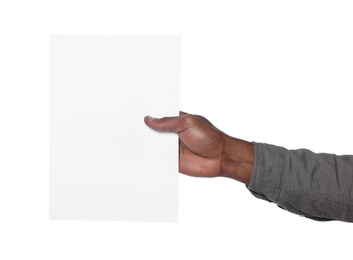 Photo of African American man holding sheet of paper on white background, closeup. Mockup for design