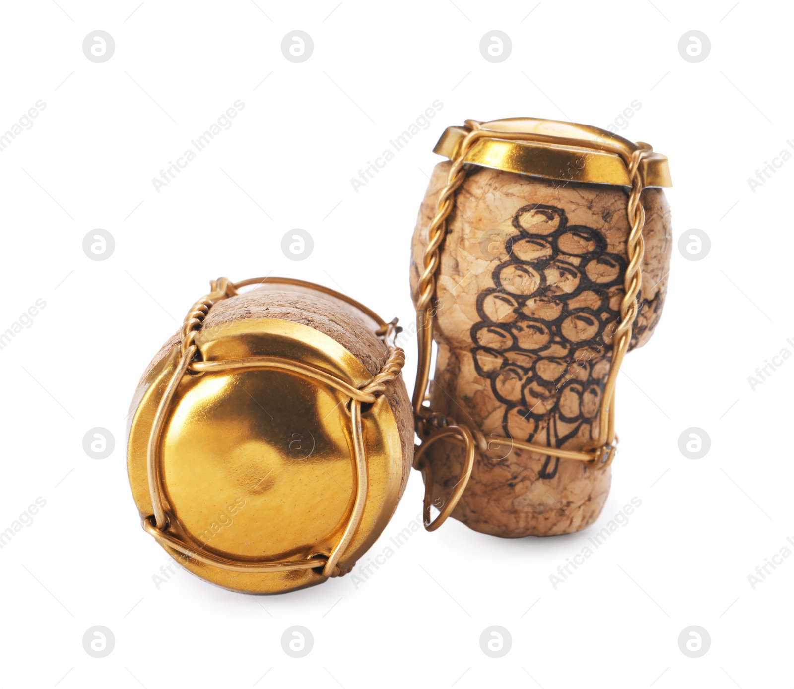 Photo of Corks of sparkling wine and muselet caps on white background