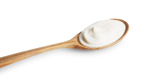 One wooden spoon with mayonnaise isolated on white