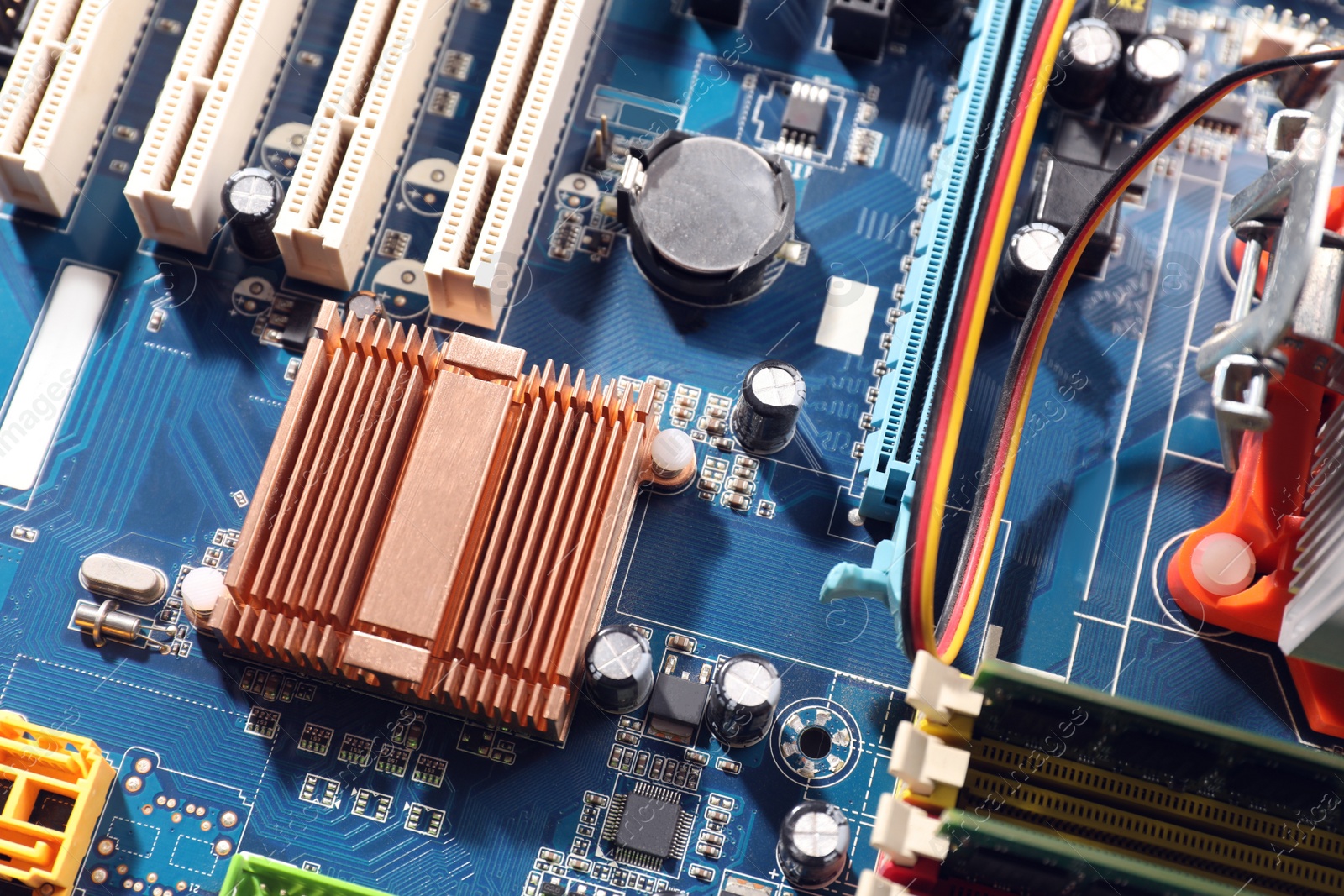 Photo of Computer motherboard as background, closeup. Electronic device