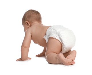 Photo of Cute little baby in diaper crawling on white background