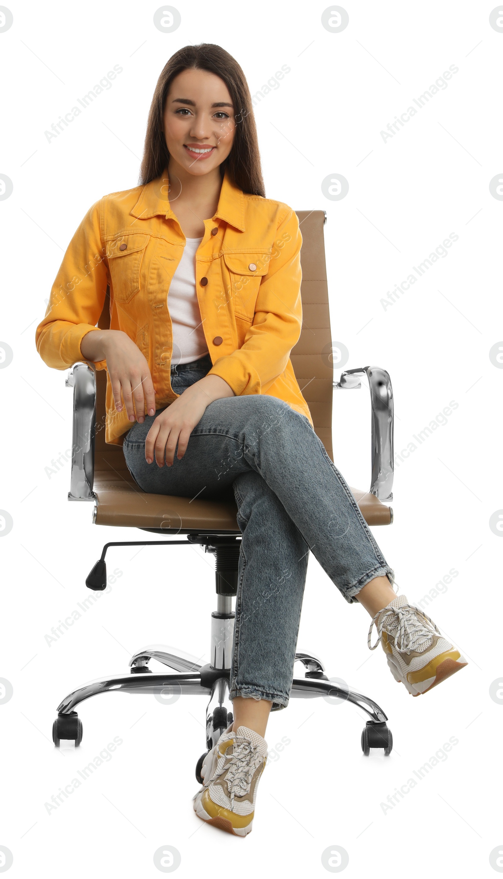 Photo of Young woman sitting in comfortable office chair on white background