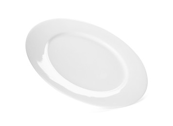 Photo of Clean empty ceramic plate isolated on white