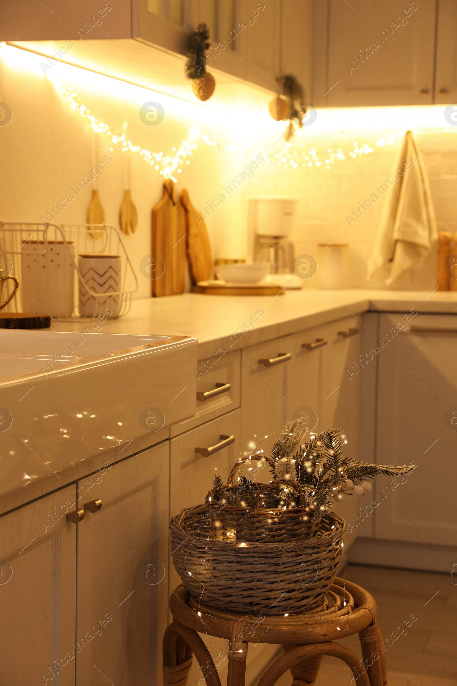 Photo of Cozy kitchen decorated for Christmas. Interior design