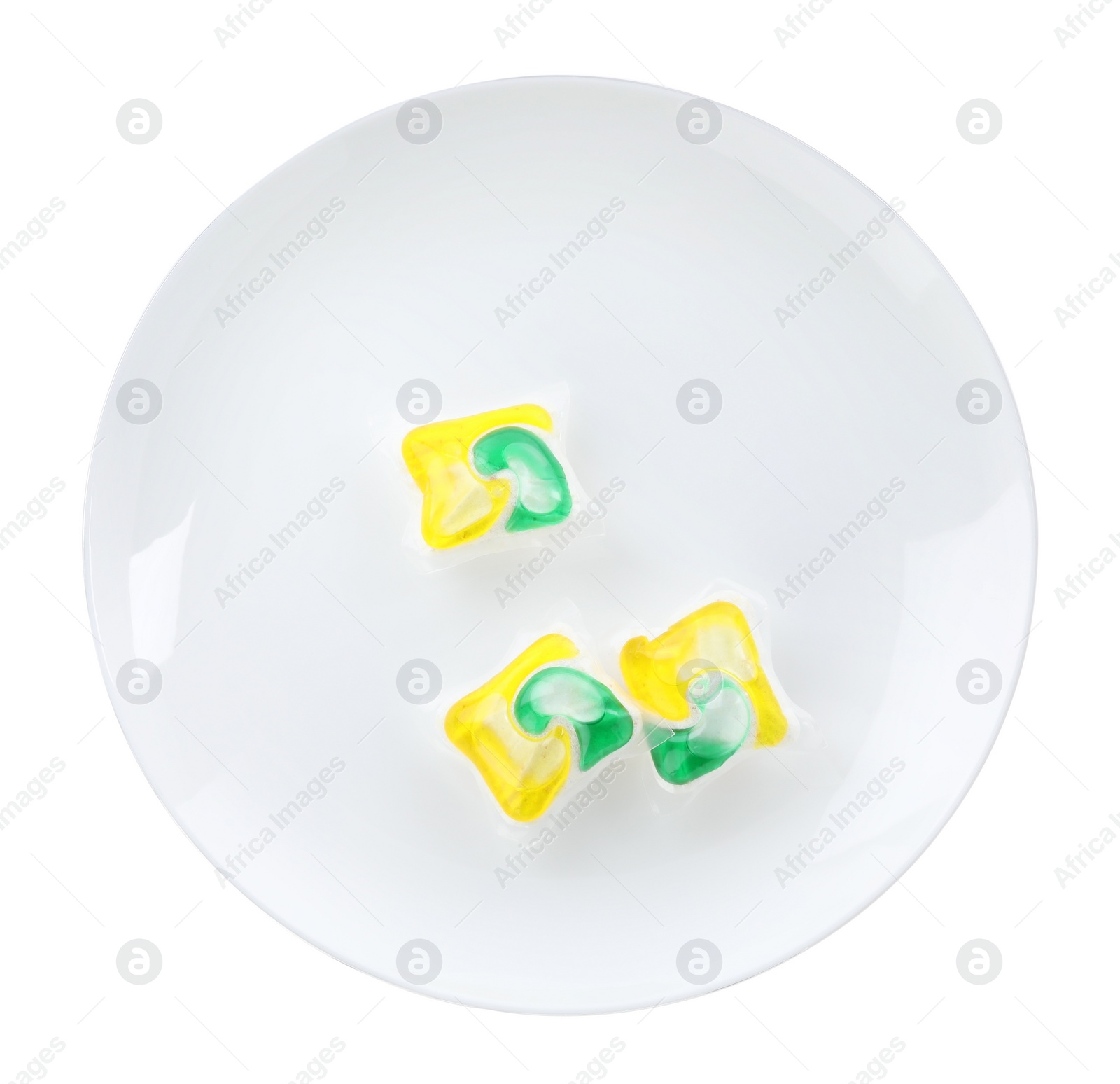 Photo of Plate with dishwasher detergent pods on white background, top view