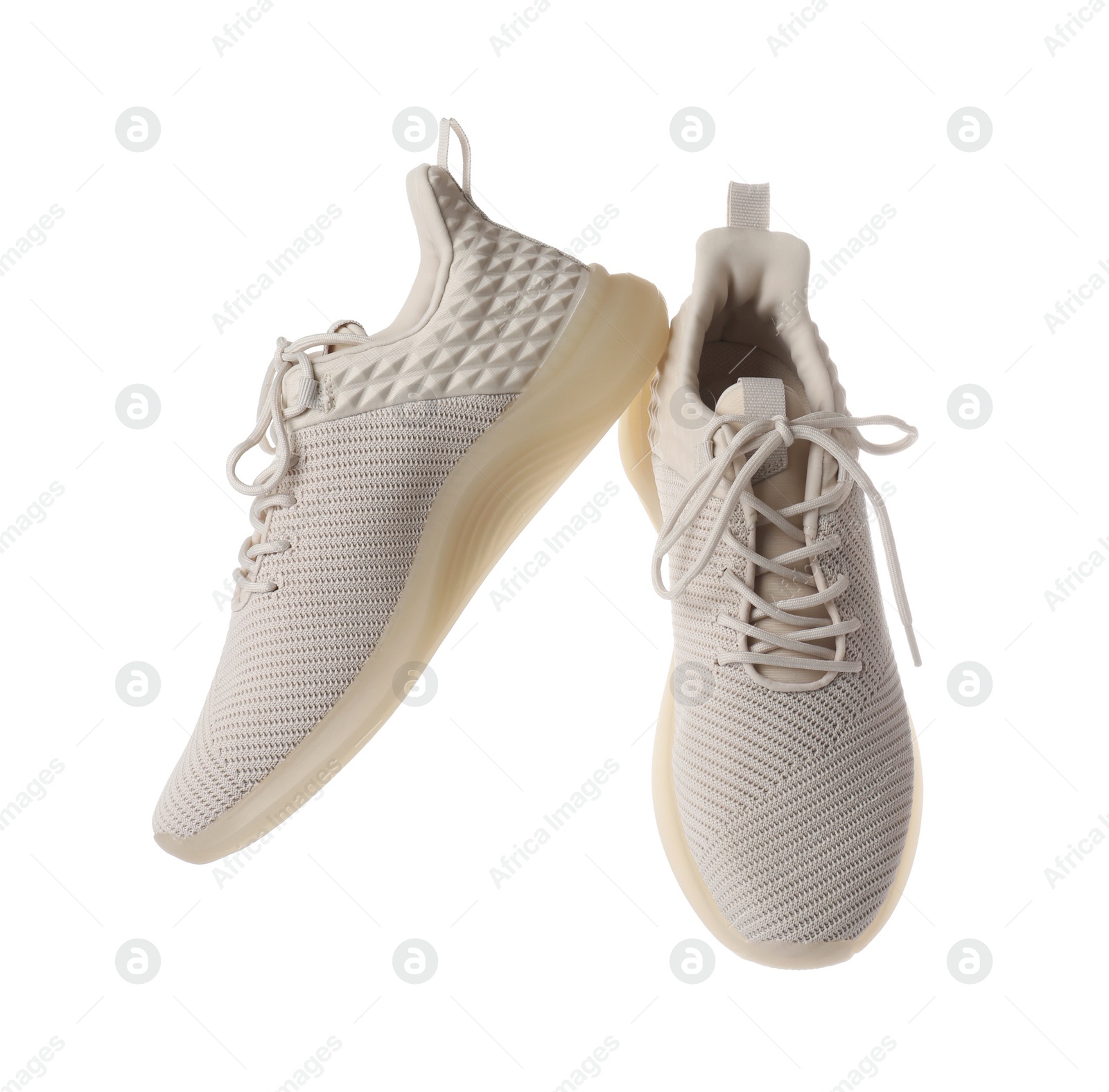 Photo of Pair of stylish sport shoes isolated on white