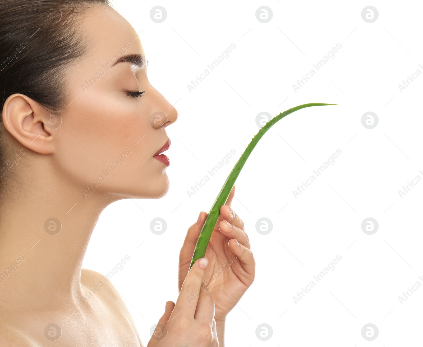 Photo of Young woman with aloe vera leaf on white background, closeup