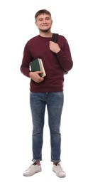 Young student with backpack and books on white background