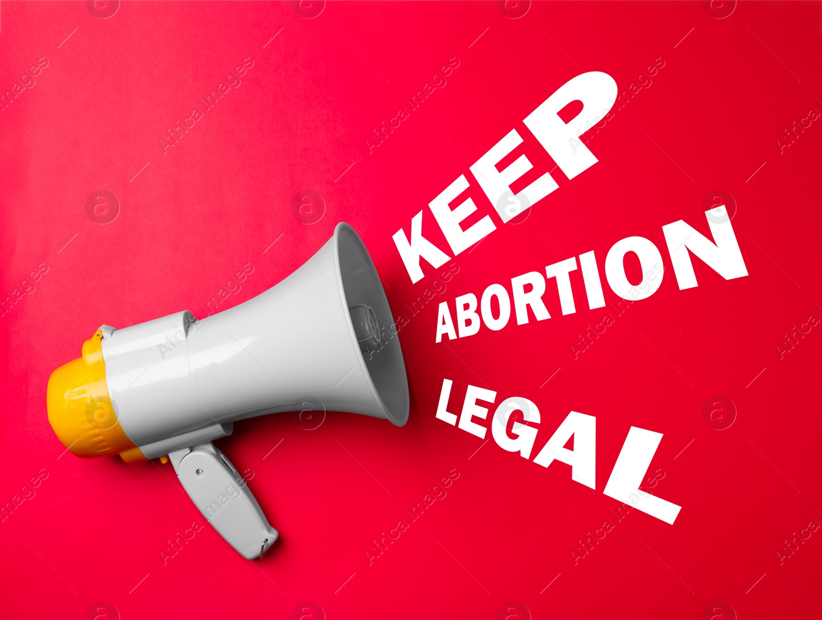 Image of Abortion rights protest. Megaphone with slogan Keep Abortion Legal on red background