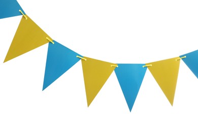 Photo of Triangular bunting flags on white background. Festive decor