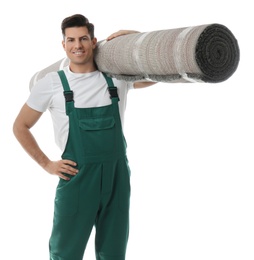 Male worker with rolled carpet on white background