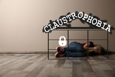 Image of Claustrophobia. Scared little girl feeling in closed space and crying